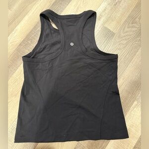 Lululemon align waist length racer back tank top. Like new. Size 10. Black.
